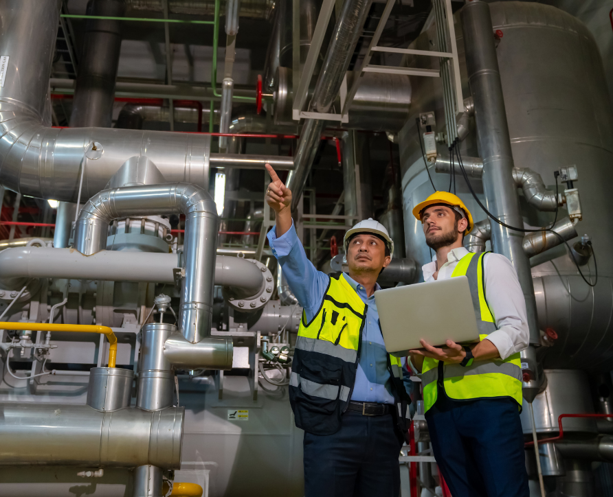 A safety Officer assessing risk with an engineer through Safety Champion Software