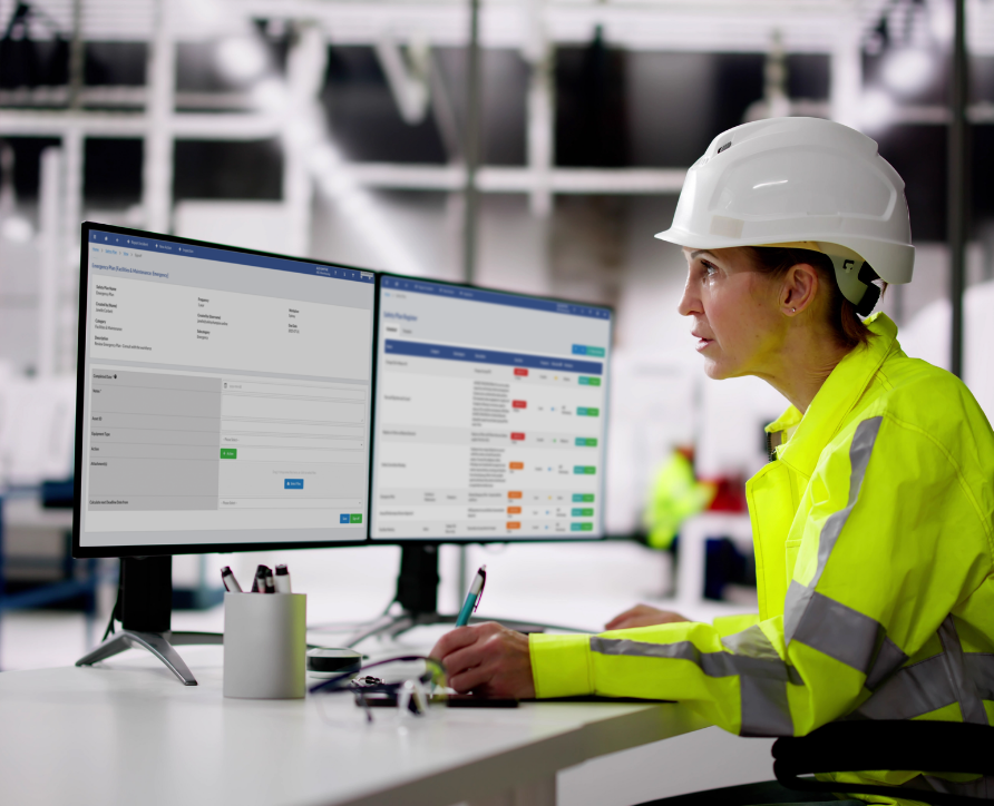 A safety officer signing off a task of the safety plan through Safety Champion Software in her desktop computer.