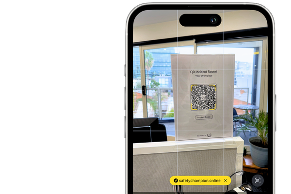 A mobile phone with the camera open scanning a QR code linking to Safety Champion Incident Reporting.